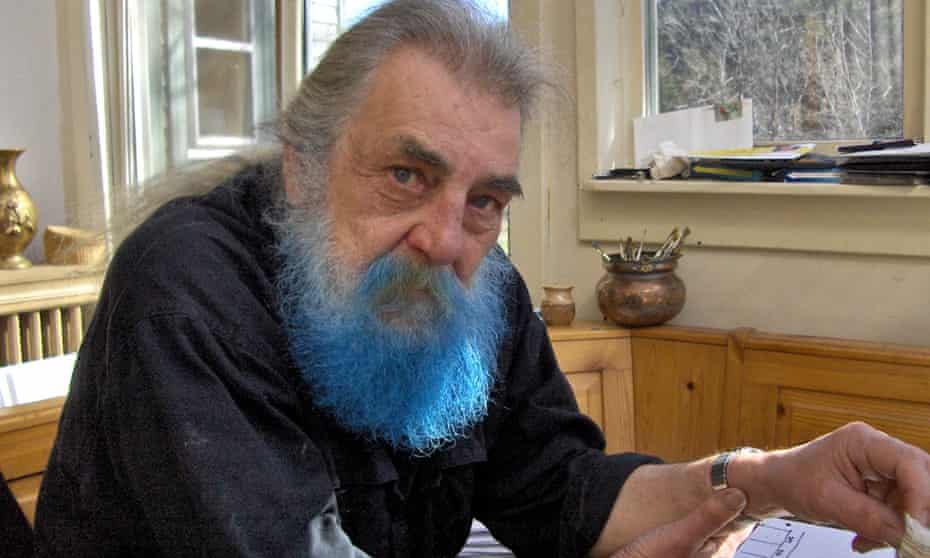 Robin Page with his striking blue beard as he produced his series of paintings Bluebeard AMuseum.