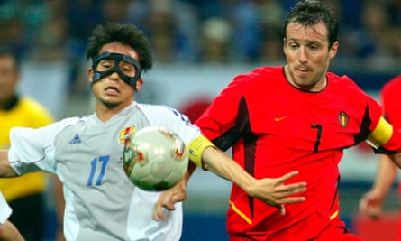 Japan's Tsuneyasu Miyamoto, left, in action against Belgium at the 2002 World Cup. Japan co-hosted the tournament, which help cement its relationship with Sepp Blatter.