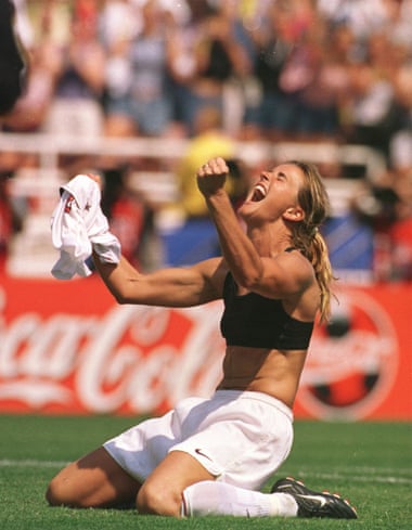 Brandi Chastain of the US celebrates and takes her shirt off after scoring with the decisive penalty against China in the World Cup Final in July 1999.