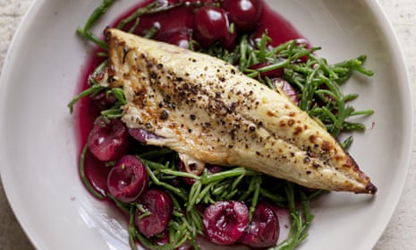 Grilled mackerel, pickled cherries and samphire on a round plate