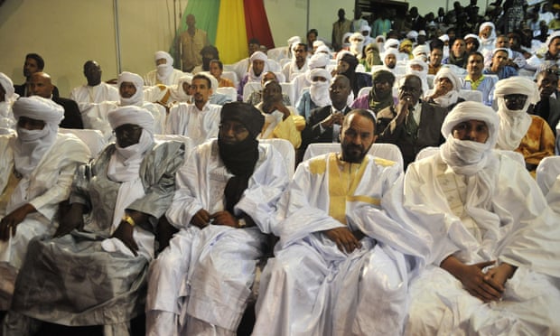 Representatives of the Azawad Movement attend the signing of the ammended version of the Algerian Accord on June 20, 2015 in Bamako. Mali's Tuareg-led rebel alliance signed the landmark deal to end years of unrest in a nation riven by ethnic divisions and in the grip of a jihadist insurgency. The document had already been signed in May by the Malian government and loyalist militias but the Coordination of Azawad Movements (CMA), a coalition of rebel groups, had been holding out until amendments were agreed two weeks ago.