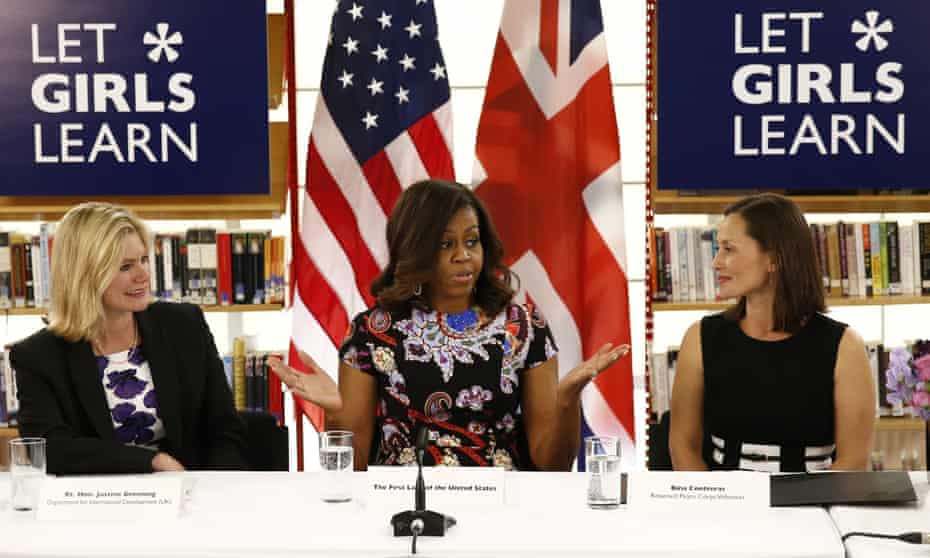 US First Lady Michelle Obama (C) talks during a roundtable discussion on girls education around the world