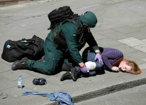 A member of the emergency services tends a casualty 
