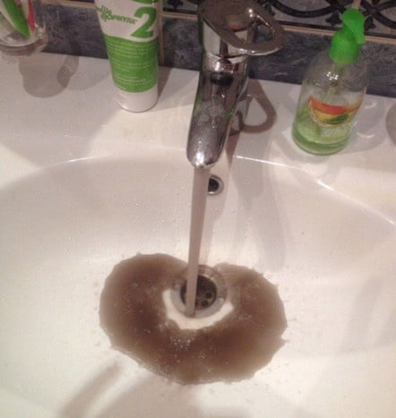 Locals have uploaded photographs of oily water in their backyards and sinks.