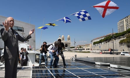 Laurent Fabius on PlanetSolar, the world’s largest solar-powered boat, in Marseille. He called for more investment in renewable energy, suggesting it could allow sub-Saharan Africa to bypass the need for fossil fuels.