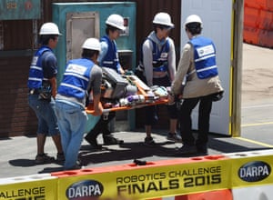 Jaxon, developed by team Nedo-JSK from the University of Japan, is carried out on a stretcher after falling.