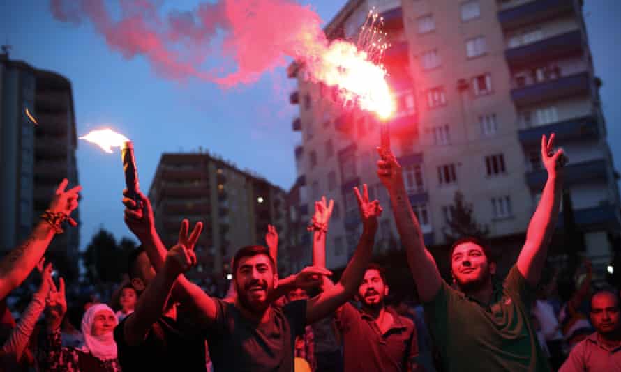 People celebrate election results of the pro-Kurdish Peoples's Democracy party.