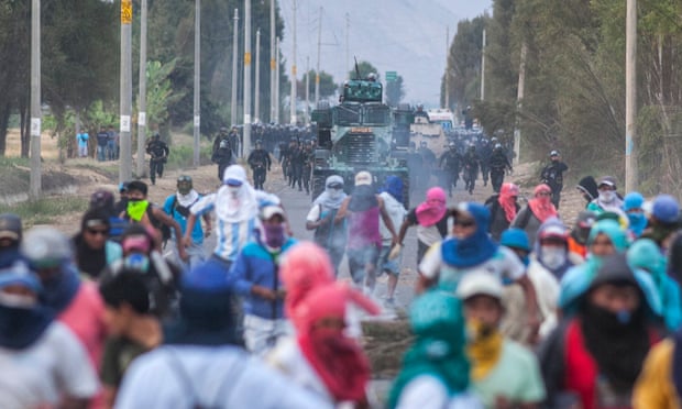 Police fighting local inhabitants in Cocachacra, southern Peru, protesting the proposed Tia Maria mine.