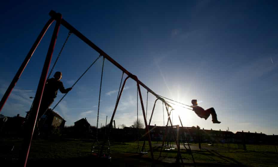 children playing on swings