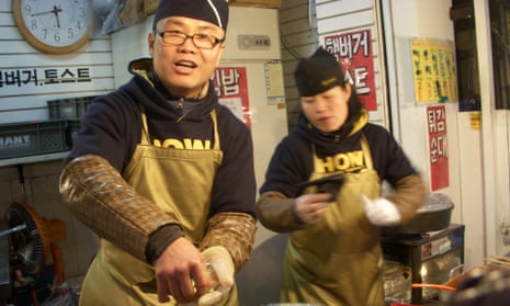 Hotteok vendors do a great trade in South Korea, but are they as popular in the North? <a href="https://www.flickr.com/photos/yearofeats/2347324051/">Photograph: /flickr</a>