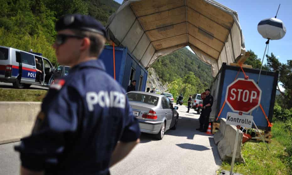 Austrian police officers check cars near the town of Telfs, prior the 2015 Bilderberg conference.