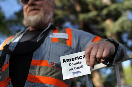 A coal miner holds a sign during a campaign rally for Republican presidential candidate, former Massachusetts Gov. Mitt Romney at Alice Pleasant Park on May 29, 2012 in Craig, Colorado. Mitt Romney will campaign in Colorado and Las Vegas, Nevada.