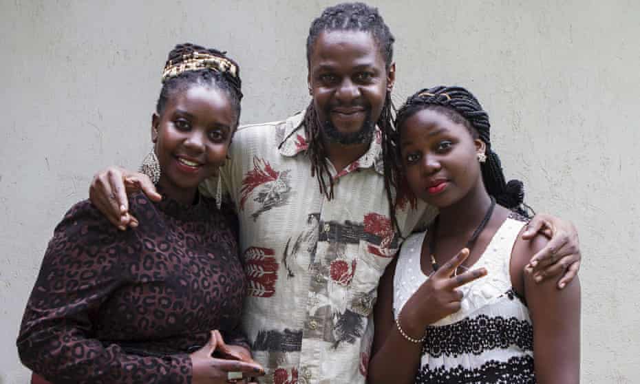 Newzbeat's host Sharon Bwogi aka Lady Slyke (left), producer Daniel Kisekka aka "Survivor" (centre) and rapper 14-year-old Zoe Kabuye in Kampala.