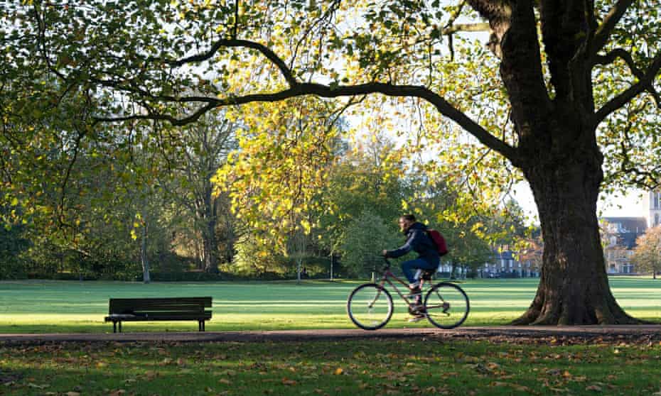 A man cycling in Cambridge