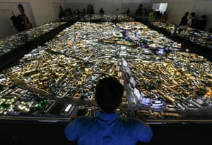 A visitor views a scale model of central Moscow at VDNKh Exhibition Centre