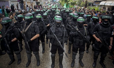 Masked Palestinian gunmen of the Hamas militant group