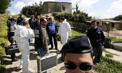 Italian forensic police at the house where mafia boss Bernardo Provenzano was arrested near Corleone in Sicily in 2006.