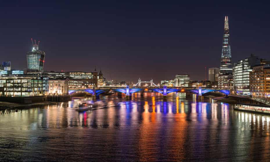 The London night skyline. Sharing such pictures could mean violating the copyright of each building's architect, under the law, and 'the UK creative industry would be encumbered with interminable bureaucracy'.