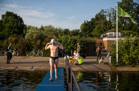 Perfect weather for a dip for the Serpentine Swimming Club in Hyde Park.