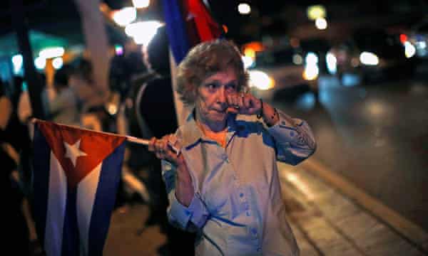 An anti-Castro Cuban exile reacts after the announcement of restoring diplomatic ties between Cuba and United States, at an area knows as 'Little Havana' in downtown Miami, Florida December 17, 2014.