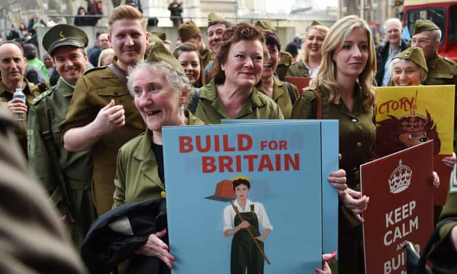 Demonstrators wearing WWII uniforms protest at a Homes for Britain rally in London, calling for political parties to end the crisis within a generation
