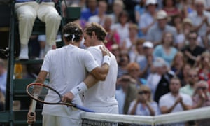 Roger Federer puts an arm round Murray after his straight sets win.