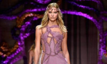 Model Karlie Kloss in a Westeros-style headddress during Atelier Versace's autumn/winter 2015/2016 show in Paris.