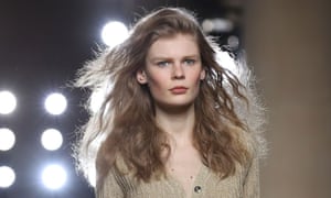 A model walks the runway at the Topshop Unique show during London Fashion Week Fall/Winter 2015/16.