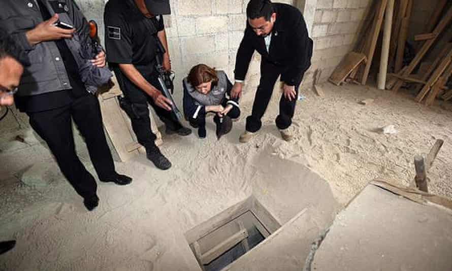 The Mexican general prosecutor inspects the tunnel that Joaquin 'Chapo' Guzman used to escape from high-security prison.