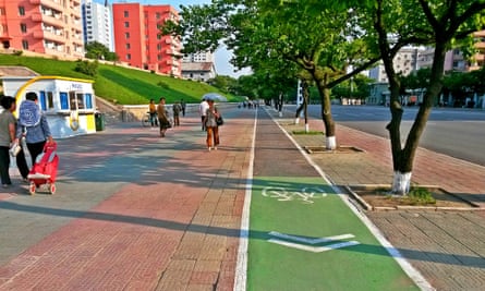 In the past, cyclists have shared the pavements with pedestrians. North Korea Pyongyang cycle