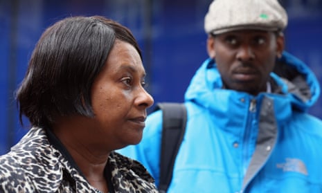 Doreen Lawrence, with her son Stuart, after a meeting with Sir Bernard Hogan-Howe, the Commissioner of the Metropolitan Police, in 2013.