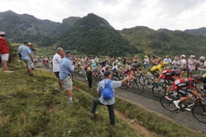 The pack with Chris Froome, wearing the overall leader’s yellow jersey, climbs towards Port de Lers pass 
