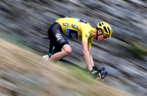 Chris Froome speeds downhill