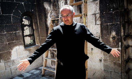 Fr Matthias shows the damage done to the church and monastery by suspected Jewish extremists.