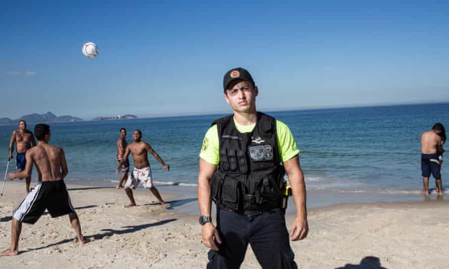 Lucky to be out of the line of fire … Copacabana tourist police officer Marcus Azevedo.