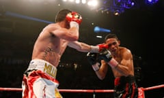 Darleys Perez is caught by Anthony Crolla in their WBA world  lightweight title fight