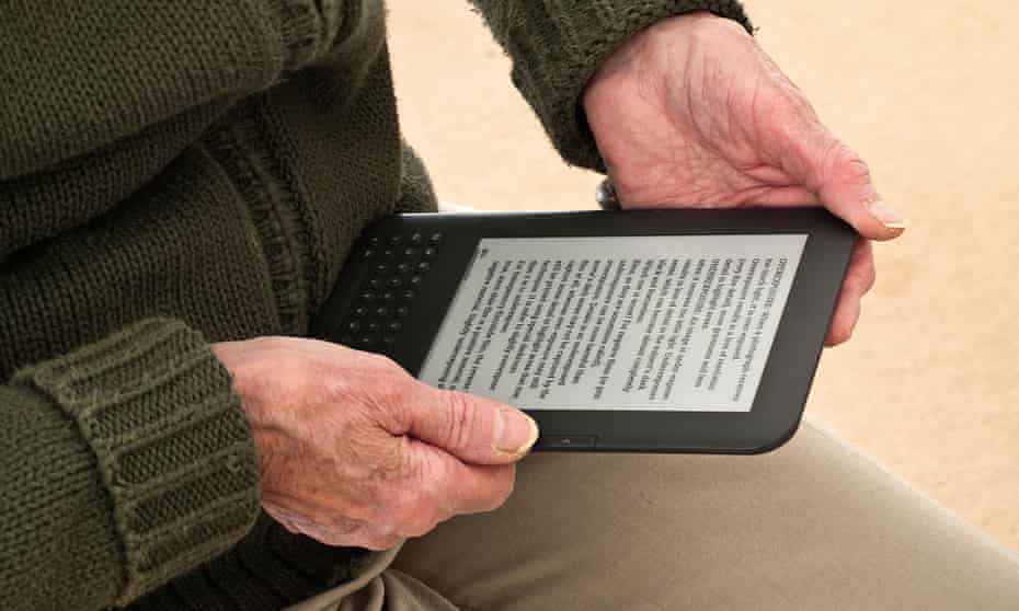 Woman reading on a Kindle
