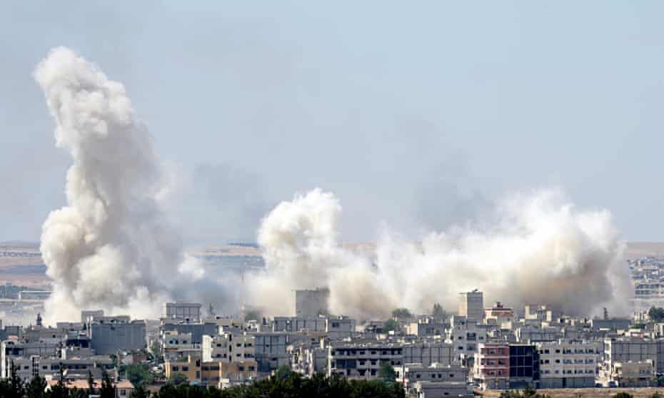 Smoke rises in the Syrian town of Kobani