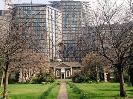 Neo Bankside looms over the neighbouring 18th-century almshouses.