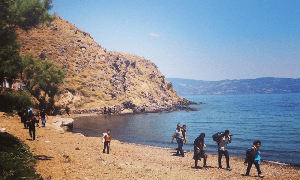 Refugees arrive on the beach in Lesvos.