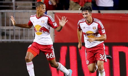 The 16-year-old Tyler Adams is pursued by his New York Red Bulls team-mate Dan Metzger after scoring against Chelsea.