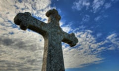 A Christian cross against the sky