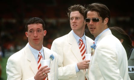 Robbie Fowler, Steve MacManaman and Jamie Redknapp look smart in their matching white suits.
