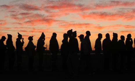 Platinum mineworkers report for work in Marikana, South Africa, after the end of a strike in 2014.