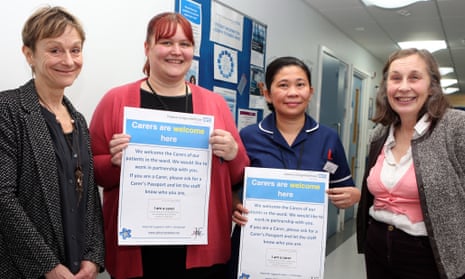 Campaigners Nicci Gerrard and Julia Jones with Jo James, lead nurse for dementia medicine, and Josephine Tapit, ward manager, at St Mary’s Hospital, Paddington, London.