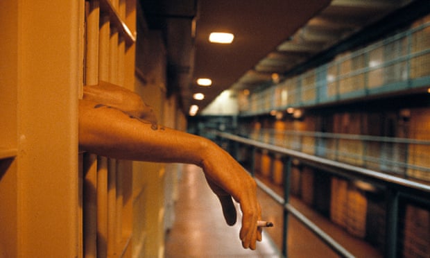 prison cell smoking cigarette