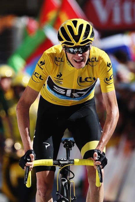 A wee smile from Chris Froome as he crosses the finish line.