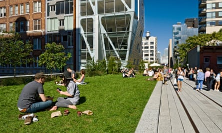 People having a picnic on the grass at the High Line Park in New York City