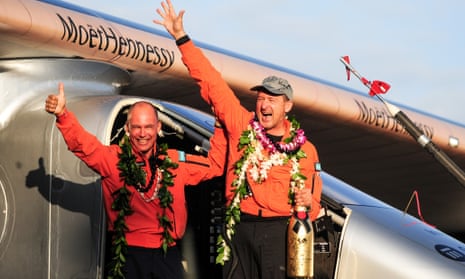 Solar Impulse 2 pilot Bertrand Piccard (left) and pilot André Borschberg celebrate after Borschberg safely landed at Kalaeloa airport, Hawaii.