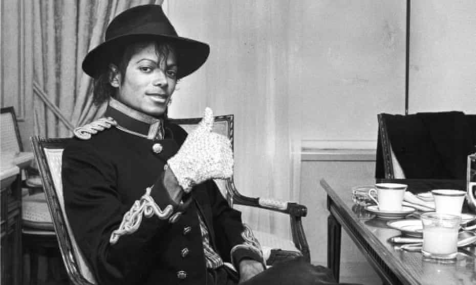 Michael Jackson and his signature gloved hand.
